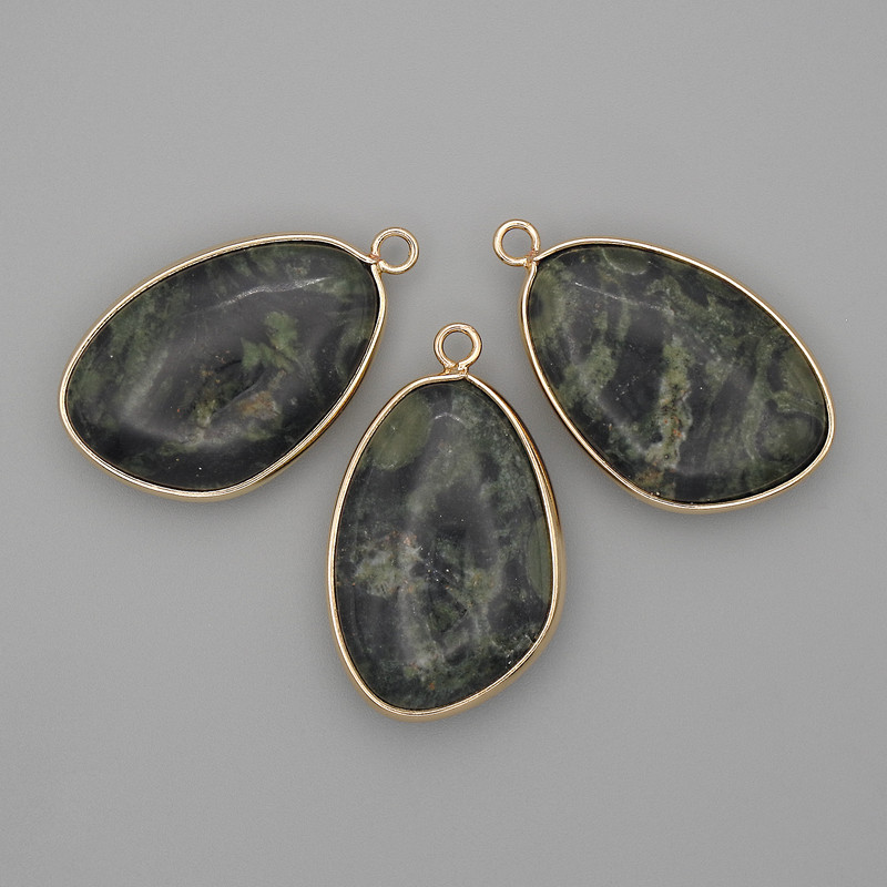 Ocean Jasper pendant in a gold-toned metal setting 21×35 mm+