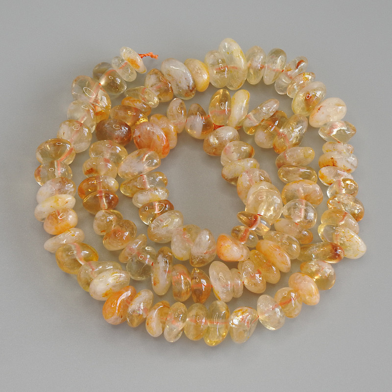Citrine beads, faceted, diameter 8-10x4-5 mm +/- on thread, length 41 cm+