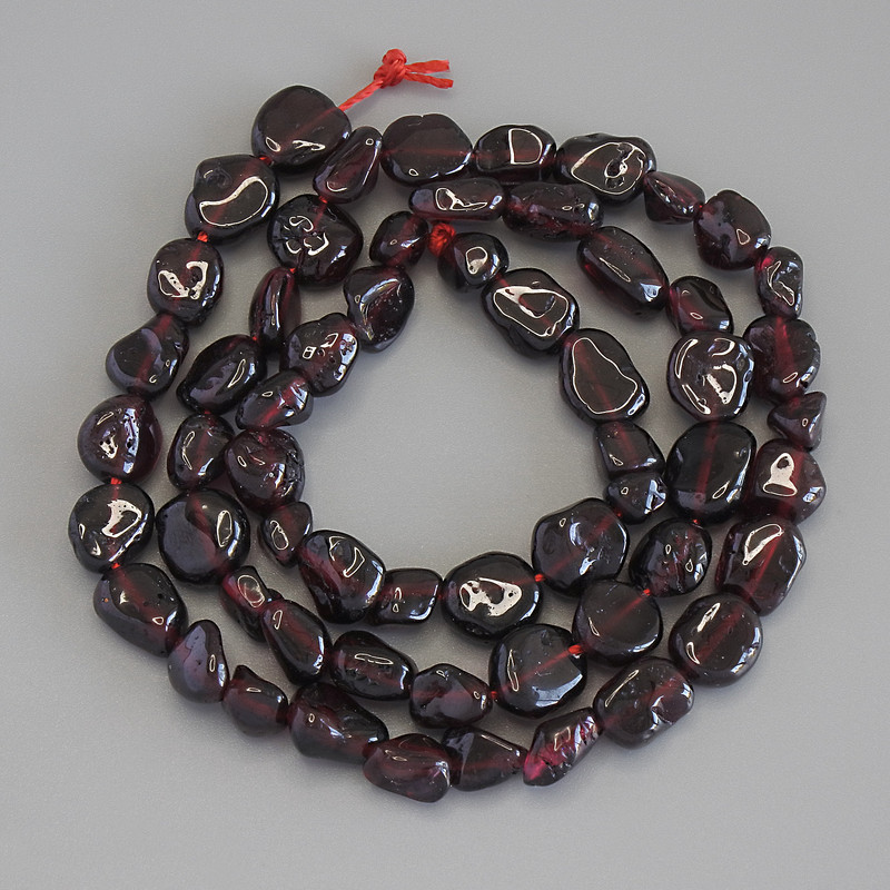 Garnet beads, faceted, diameter 5-8x5-7 mm, length 41 cm on thread
