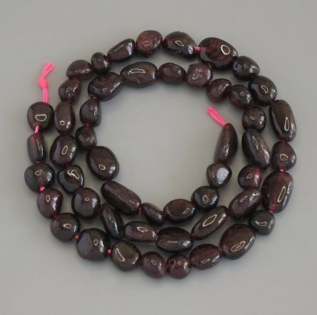 Garnet Beads, Faceted, Diameter 8-12×7-9 mm ± on Thread, Length 40 cm+