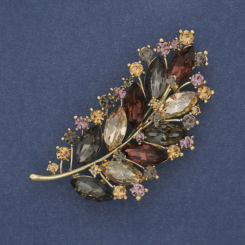 Twig Brooch with colored rhinestones in golden metal 71×35mm+