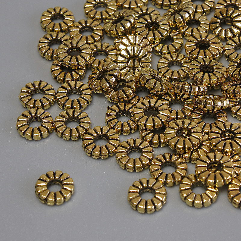 Gold-tone bead inserts, diameter 7x2 mm, hole diameter 2.5 mm, packaging 20 g (~67 pcs)