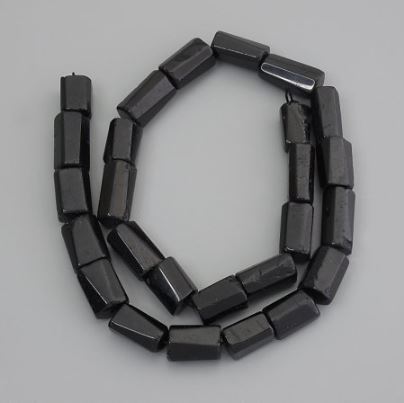 Tourmaline beads, polished stones, diameter 11-16×7-9 mm, on a thread, length 39 cm+