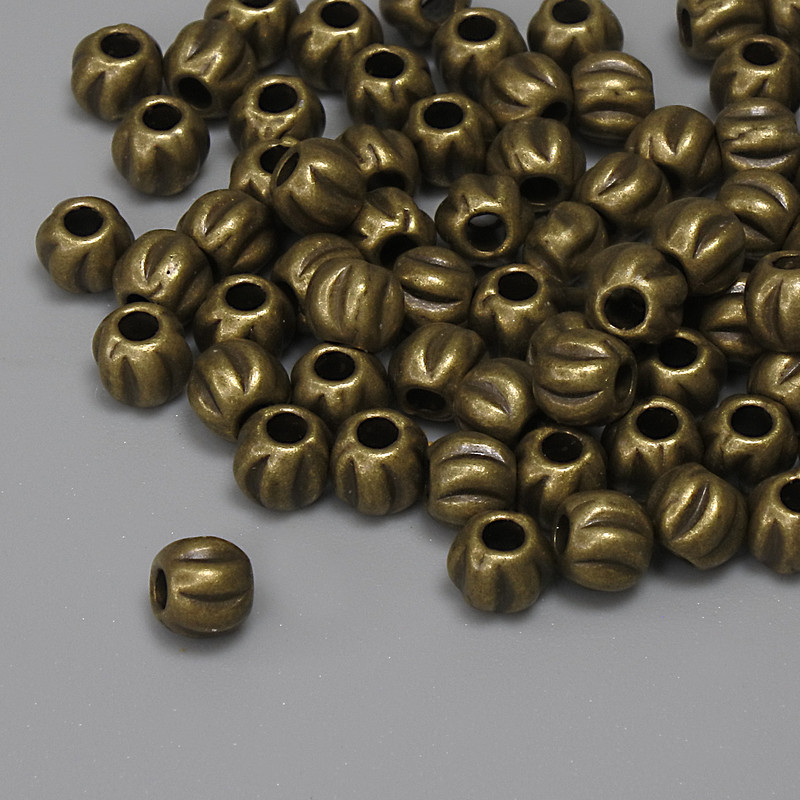 Bronze-colored bead insert findings, diameter 3.5×4 mm, hole diameter 1.6 mm, packaging 67 pcs