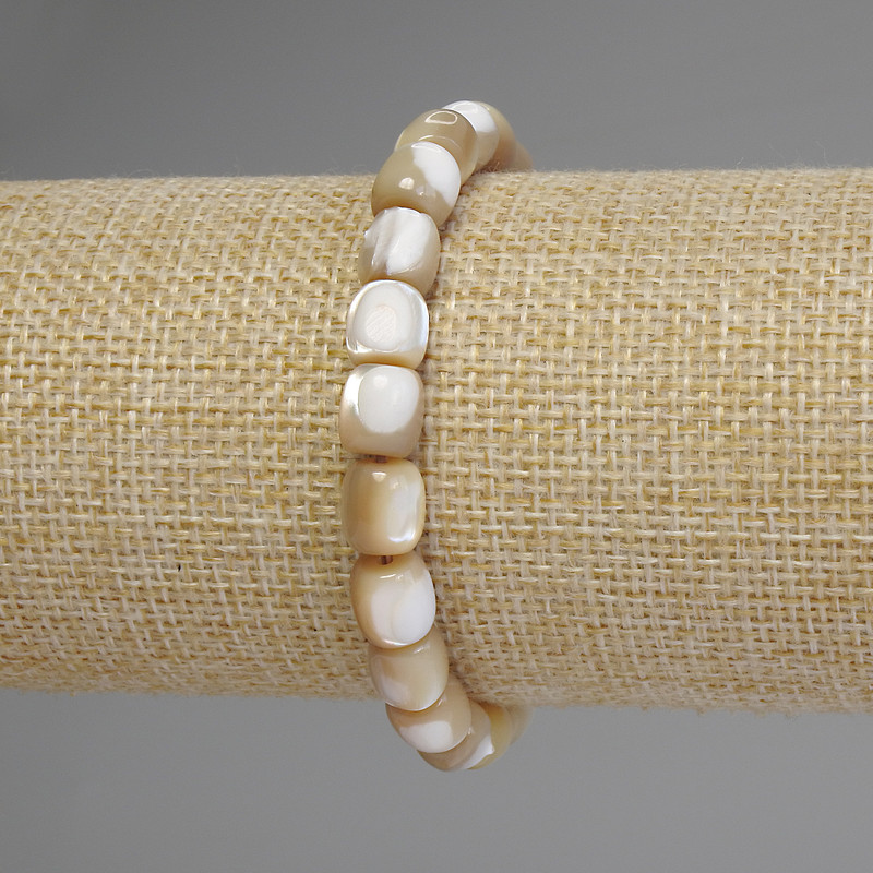 Barrel-shaped Mother-of-Pearl Bracelet, bead diameter 8x7.5 mm, stretch length 18 cm