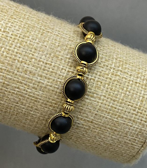 Shungite bracelet with smooth beads, diameter about 8 mm, with metal inserts, length about 18 cm, stretch