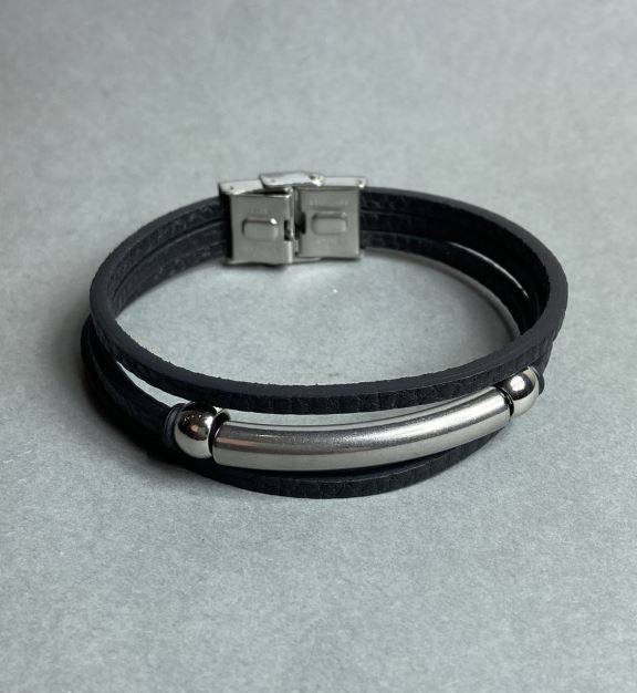 Black bracelet with metal inserts and a clasp, length 21 cm+
