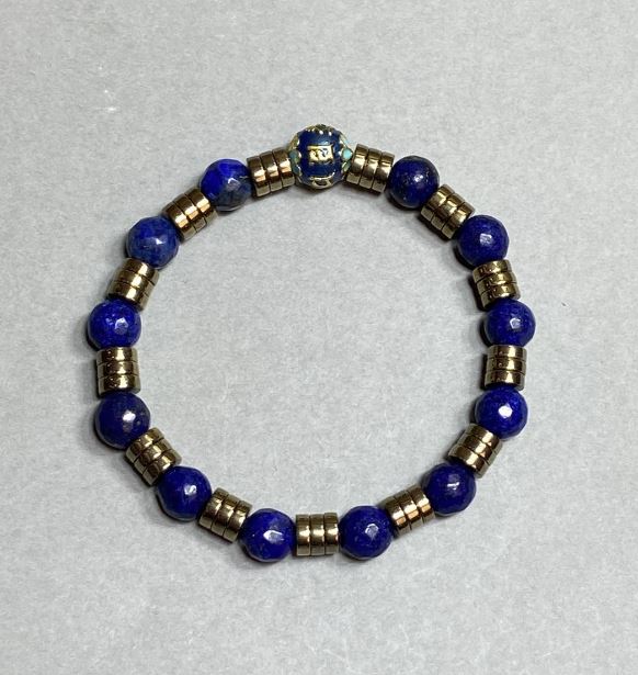 Lapis lazuli bracelet with faceted 8mm beads ± with metal inserts, 18 cm stretch