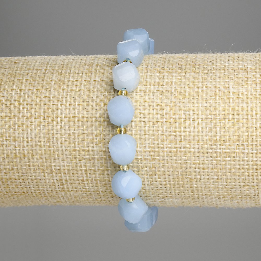 Aquamarine bracelet with faceted rhombus shapes, approx. 10x9 mm, 3 mm beads, length 18 cm, stretch