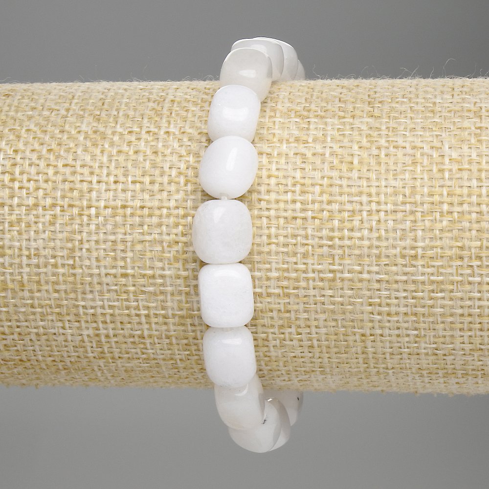Bracelet with white quartz, faceted beads, diameter 8–10 × 7 mm, length 18 cm, stretch