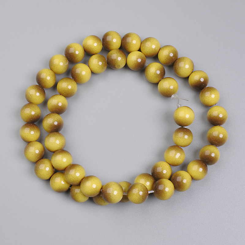 Tiger's Eye Beads (pressed) smooth rounds, 8 mm diameter ± on beading wire, length 36 cm+