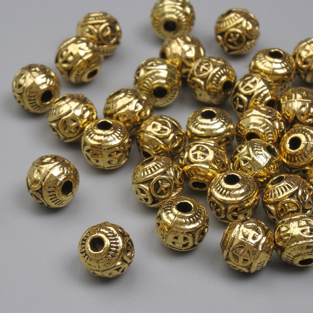 Bead insert, gold-colored metal, 6 mm diameter, hole approx. 1.5 mm, packaging 20 g (~32 pcs)