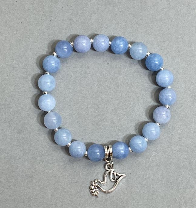 Aquamarine bracelet with smooth beads, 8.5 mm diameter, with metal inserts, 18 cm stretch