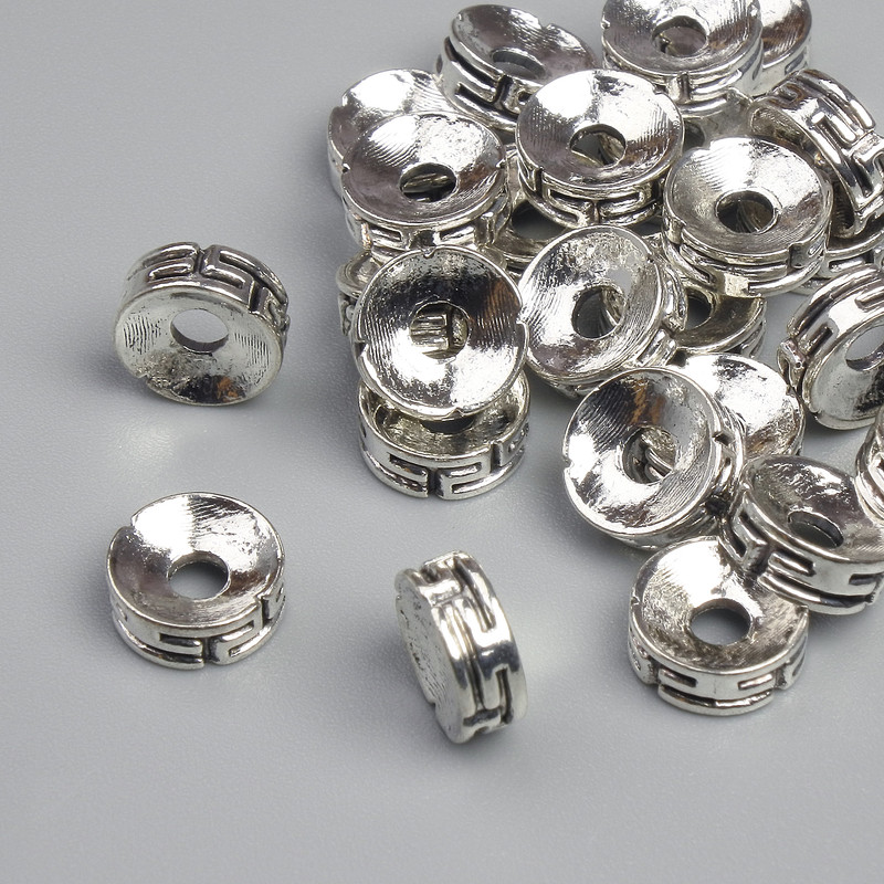 Bead insert, silver metal color, diameter 7x3 mm, hole diameter ~2.2 mm, packaging ~28 pcs.