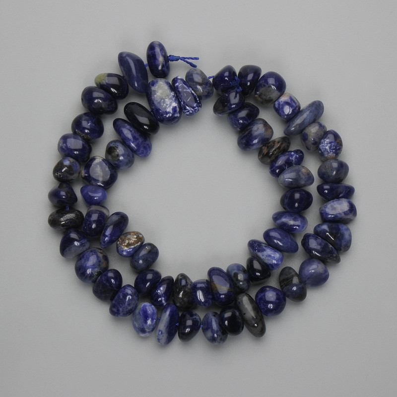 Sodalite beads, faceted, 8–16×5–7 mm, 5 mm ±, on a thread