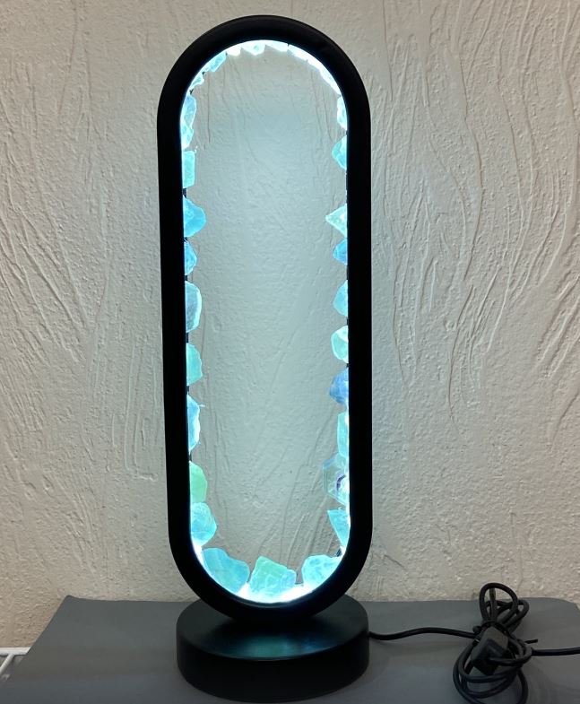 Unpolished fluorite night light in a black metal base, diameter 32.5×10 cm, USB cable