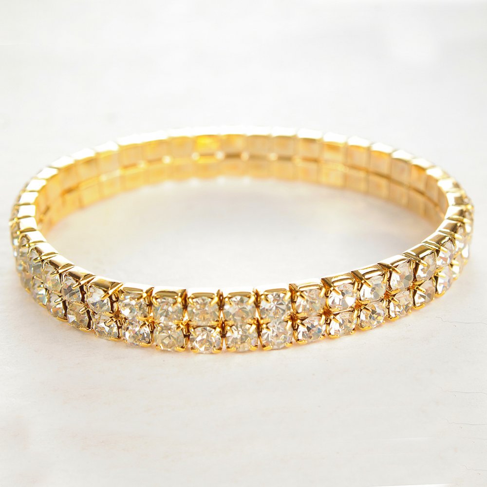 Нарядний Браслет дворядний на гумці стрази білі жовтий метал обхват 17 см