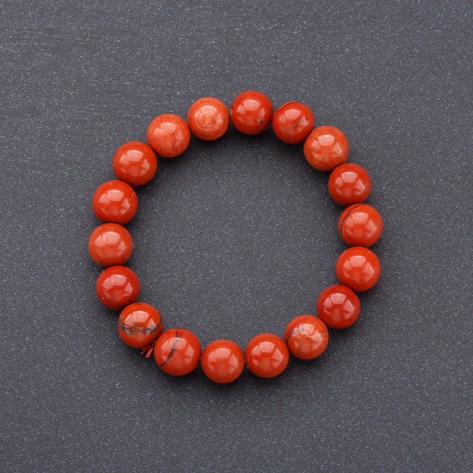 Elastic bracelet with red jasper natural stone, smooth beads, diameter 10 mm