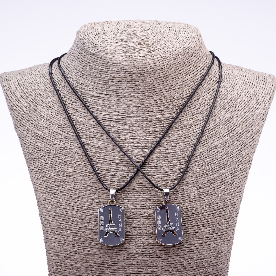 Pair of friendship pendants 'Eiffel Tower' on cord, length 45 cm, pendant diameter 20x30 mm, metal color 'silver'