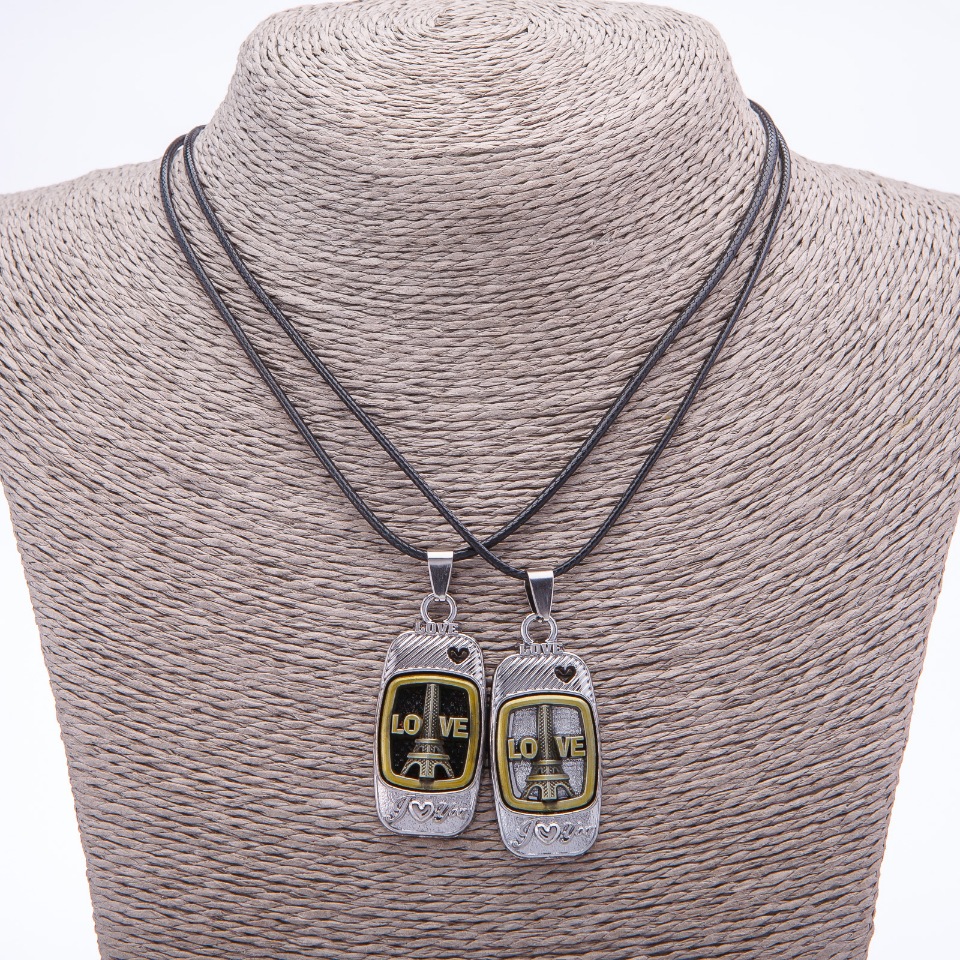 Twin pendant of friendship Love on a cord, length 45 cm, metal color 'silver and bronze'