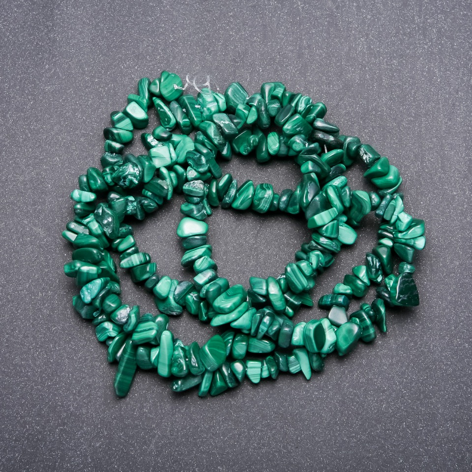 Malachite beads, natural stone on fishing line, diameter 6x3 mm +-, length 82 cm+