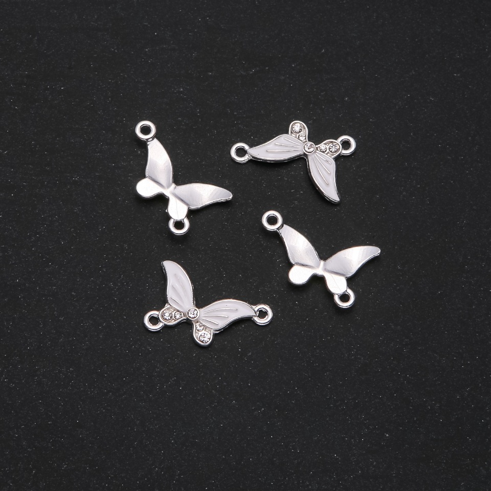 Фурнітура Коннектор Метелик біла емаль 24х12мм фас. 4шт