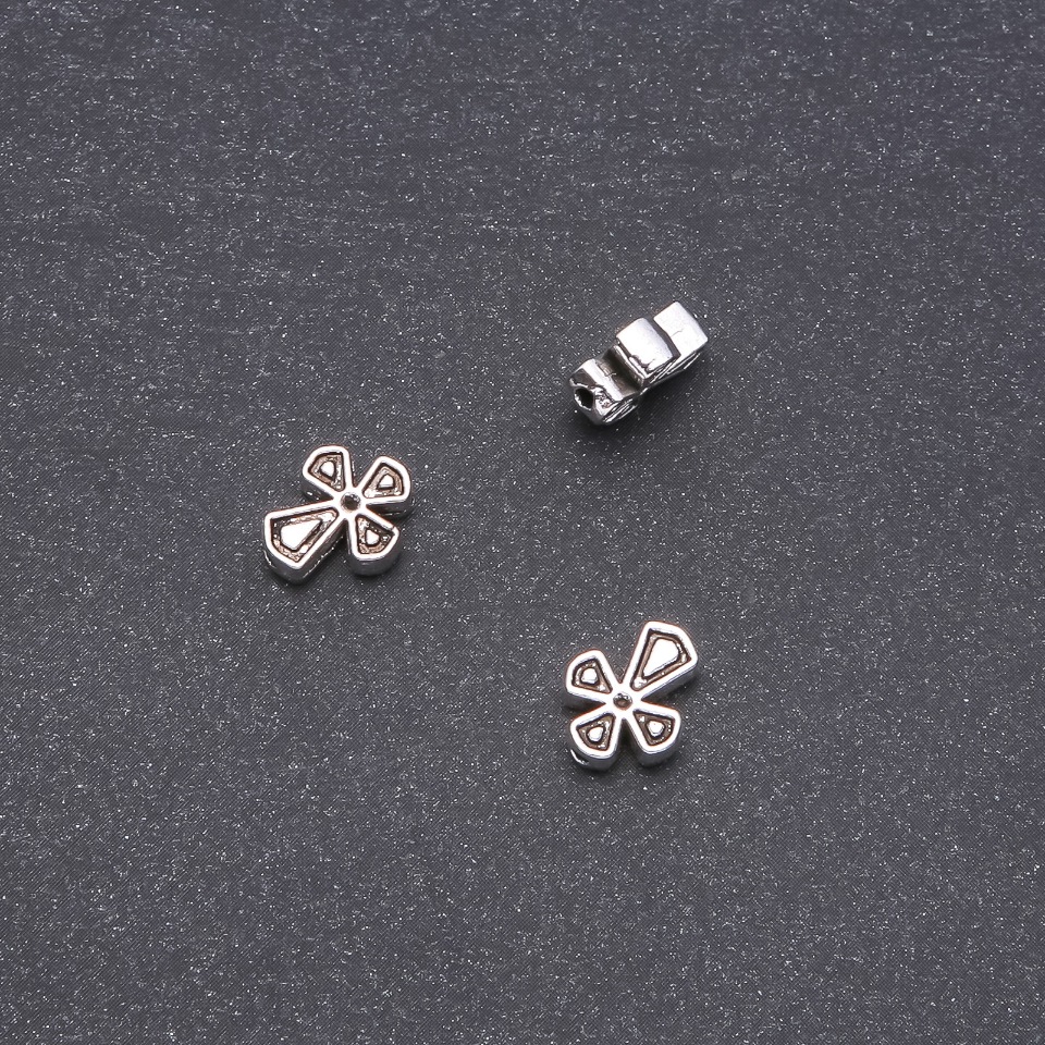 Cross-shaped bead insert finding, 9x11 mm, faceted, 20 g, +/- 20 pcs