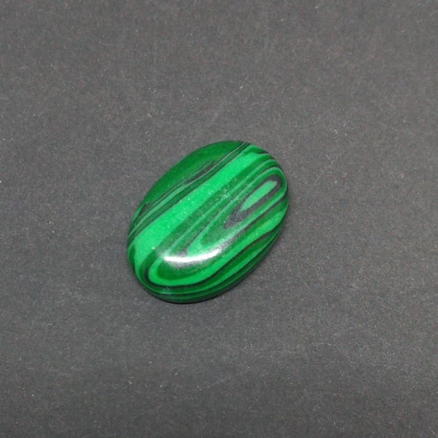 Cabochon from natural malachite (pressed) 25x18 mm