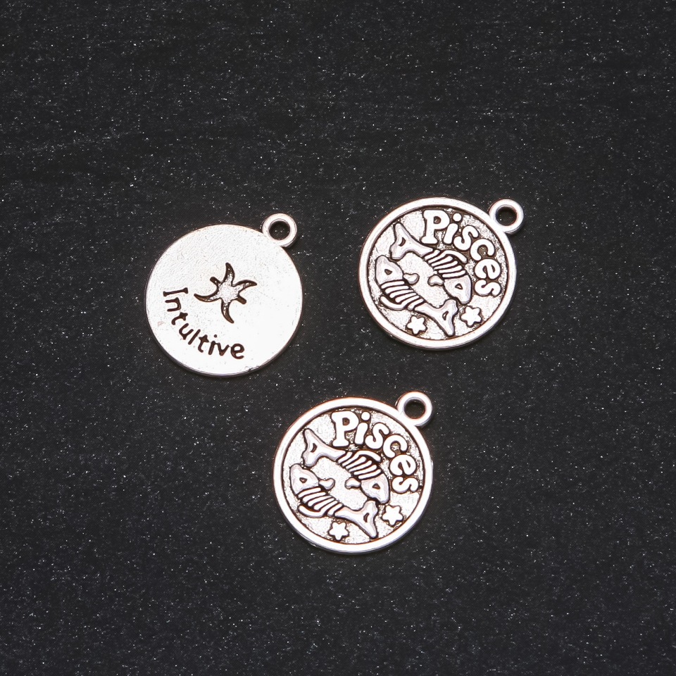 Pendant findings Zodiac Pisces, 17 mm diameter, packaging 20 g +/- 10 pcs