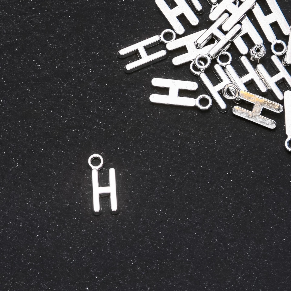 Pendant findings Letter "H" 17x7mm packaging 20 grams (± 22 pcs)