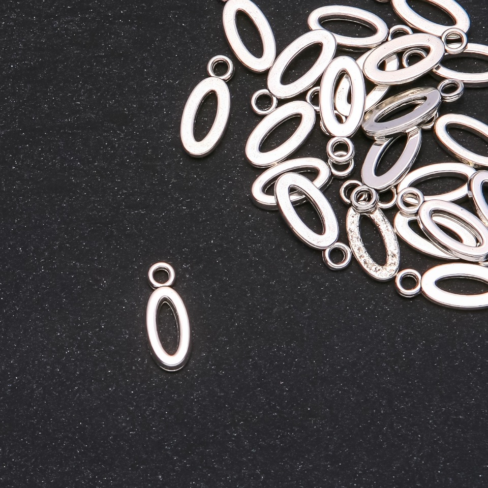 Фурнітура підвіска Буква "O" 17х7мм фасування 20грам (+ - 25шт. )