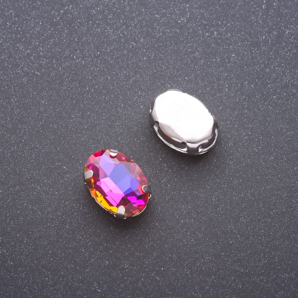 Price per pack / 10 pcs. Oval sew-on crystal in a setting 10×14 mm purple-yellow