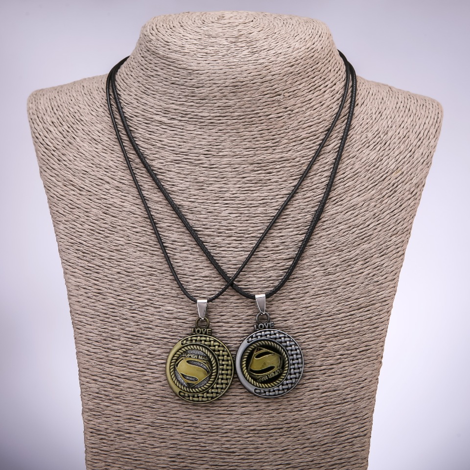 Pair of friendship pendants 'Supermen', length 42-48 cm, diameter 30 mm