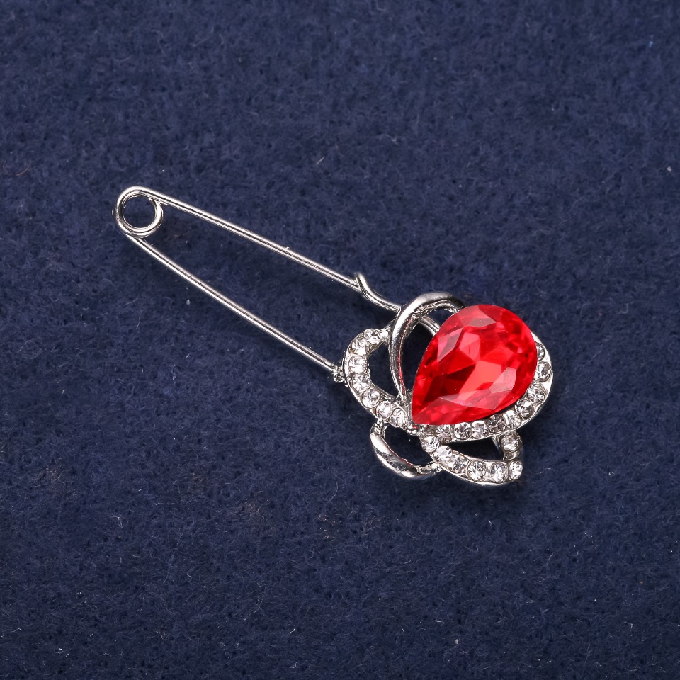 Brooch-pin 'Flower' with white crystals, red stone color, 46x19 mm, silver-colored metal