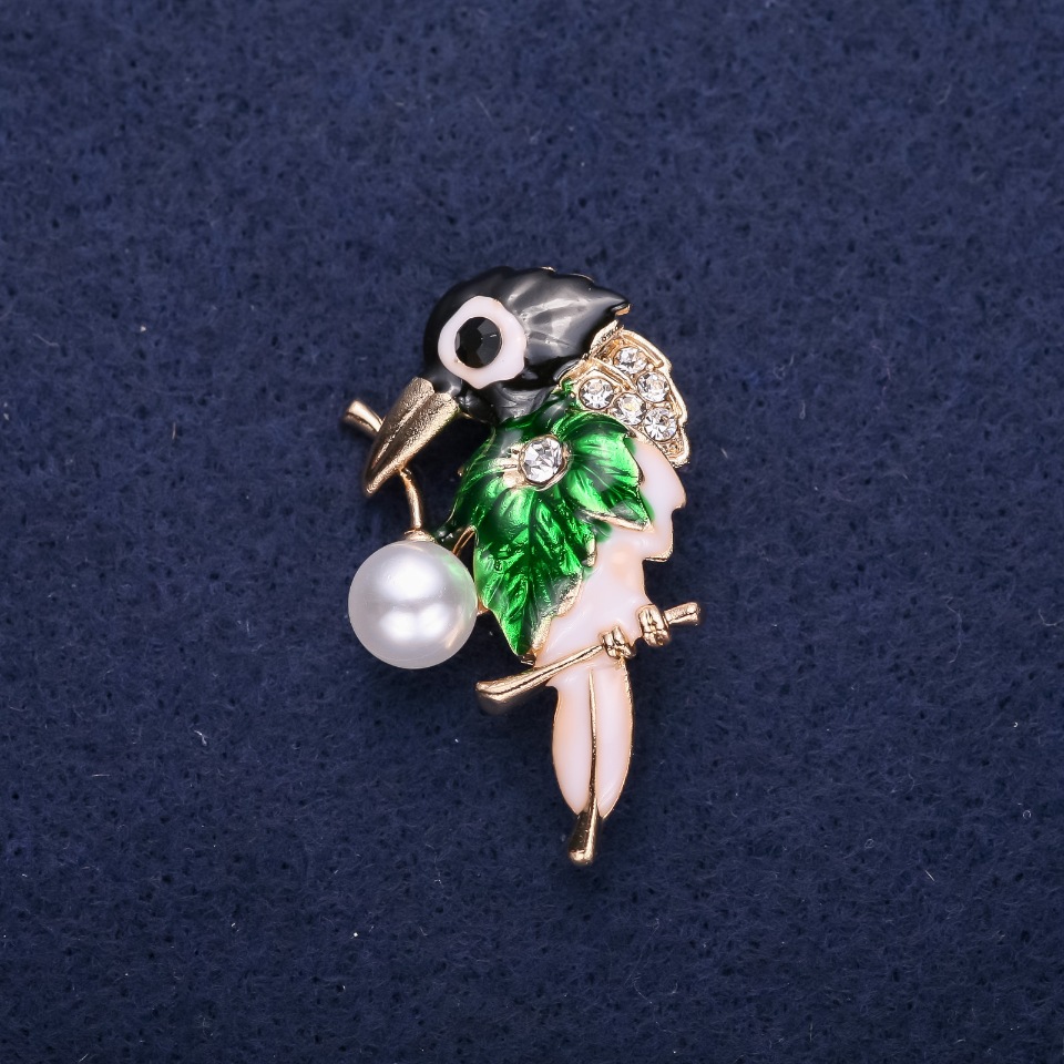 Bird Brooch with Rhinestones, Enamel in Black, White, and Green, 37×24 mm, Gold-Tone Metal