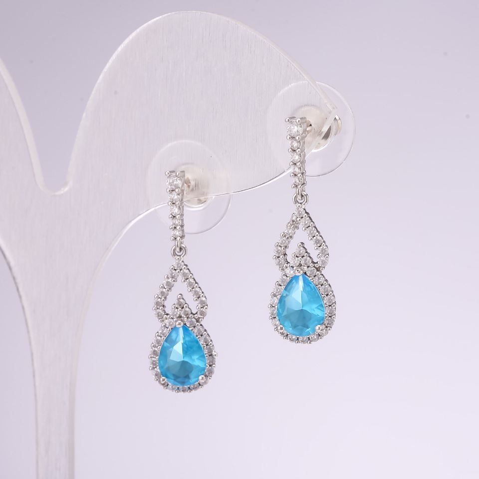 Earrings, 925 sterling silver, blue topaz-colored rhinestones, 8x28 mm, silvery metal