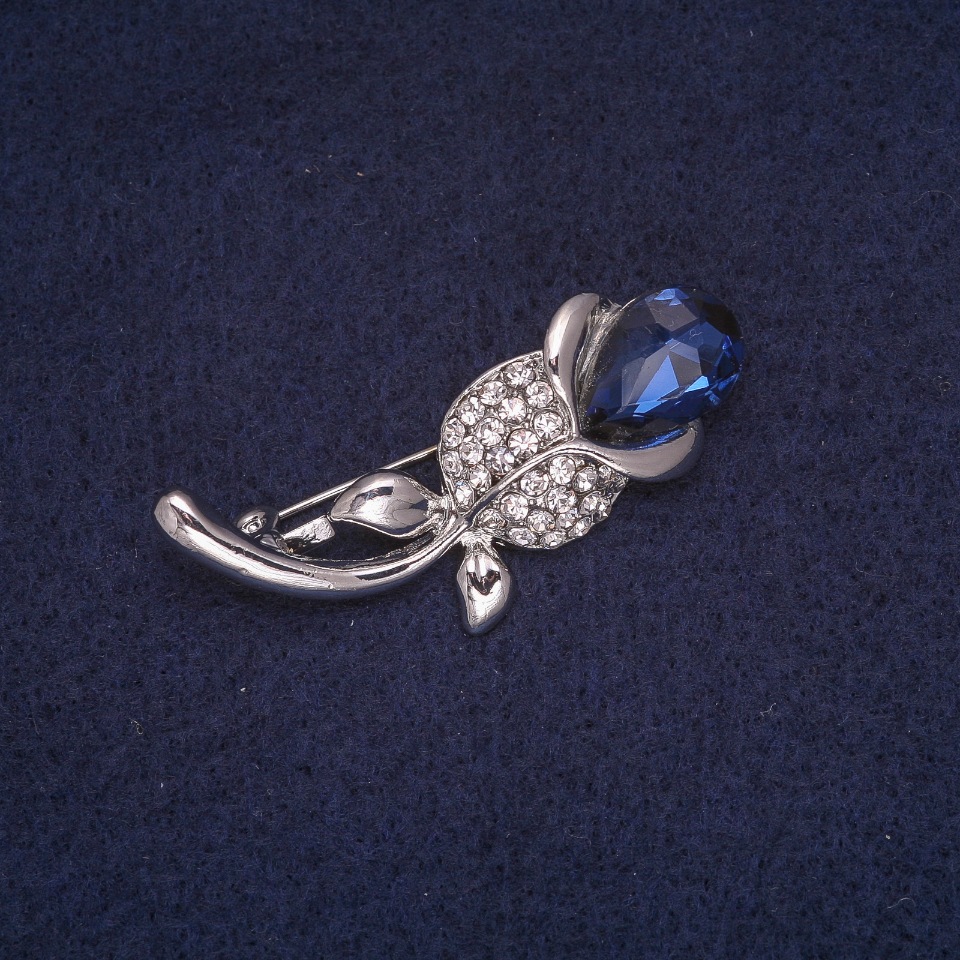 Brooch 'Rose with blue crystal'