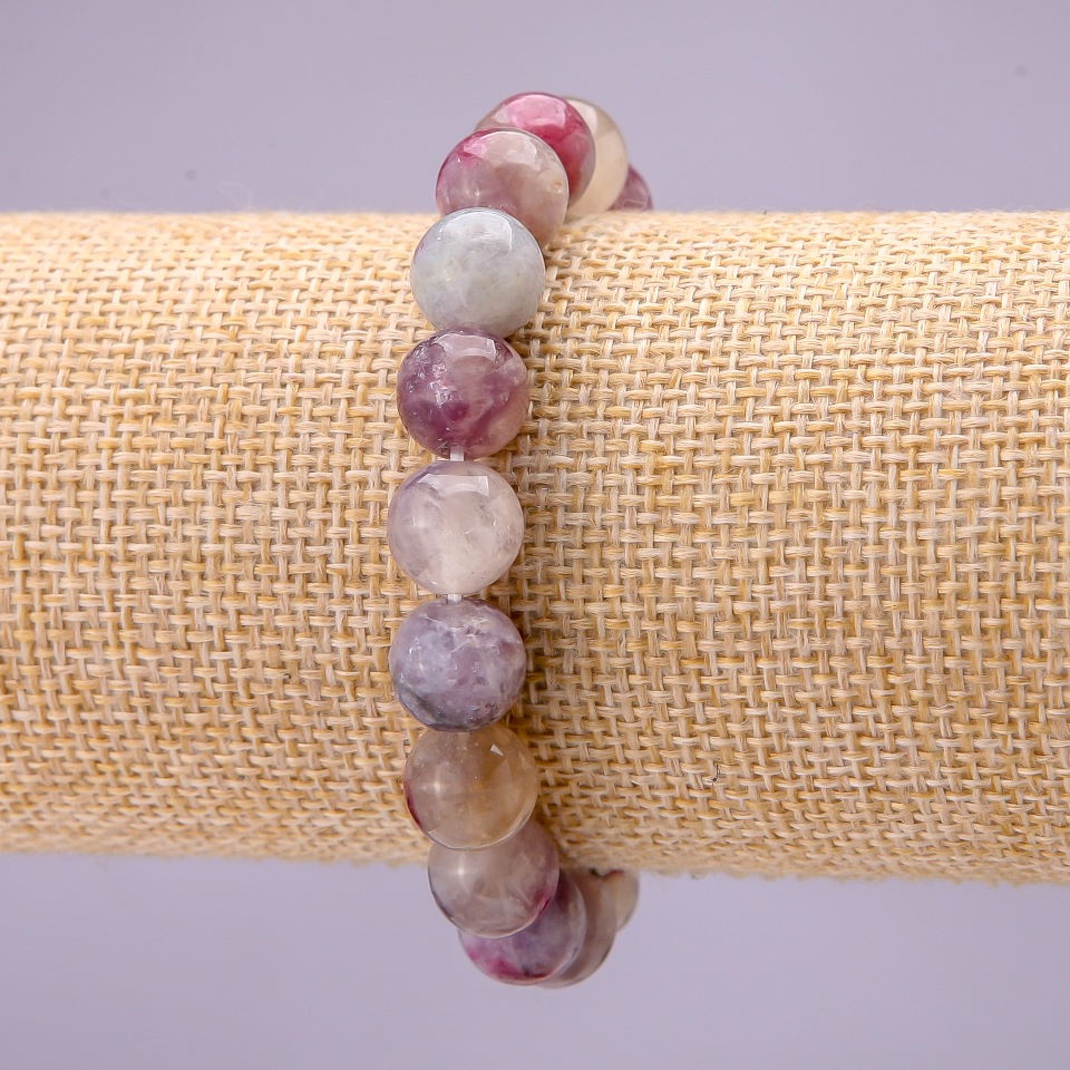 Bracelet with natural pink tourmaline — smooth beads, diameter 10 mm (±), on an elastic cord, length 18 cm