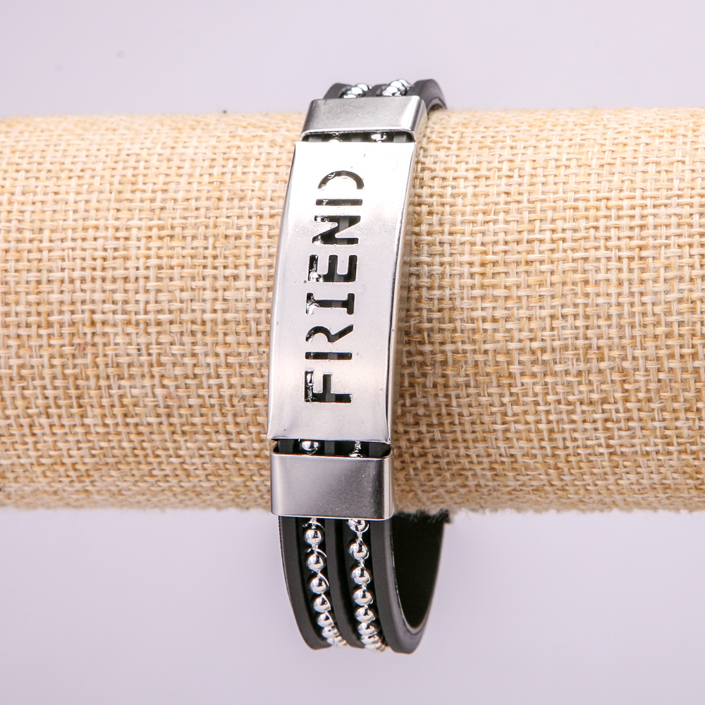 Bracelet with metal inserts, 21 cm long, 15 mm thick, black rubber, with clasp