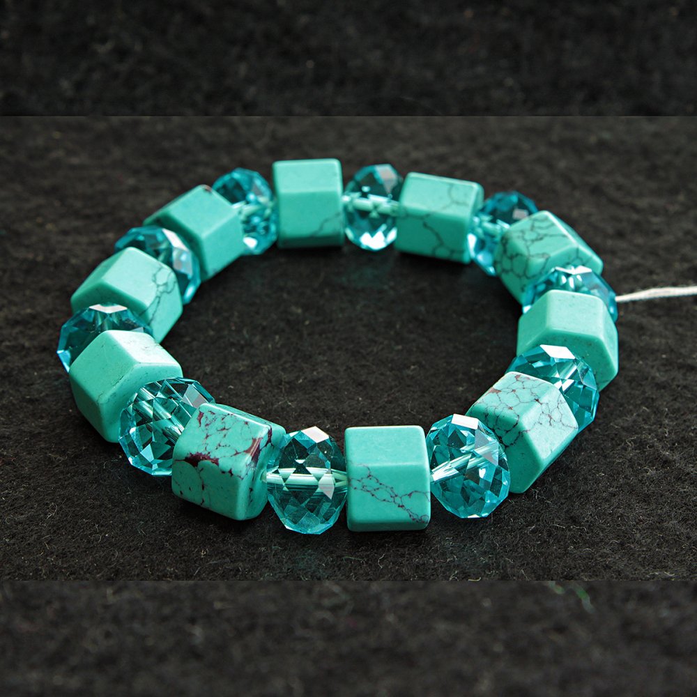 Elastic bracelet with blue turquoise (synthetic) with veining and Czech glass