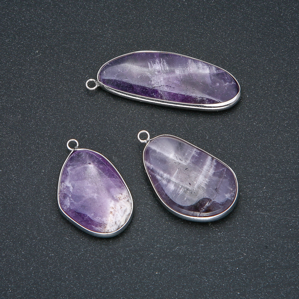Pendant with natural amethyst in a silver setting, diameter 38x20 mm+