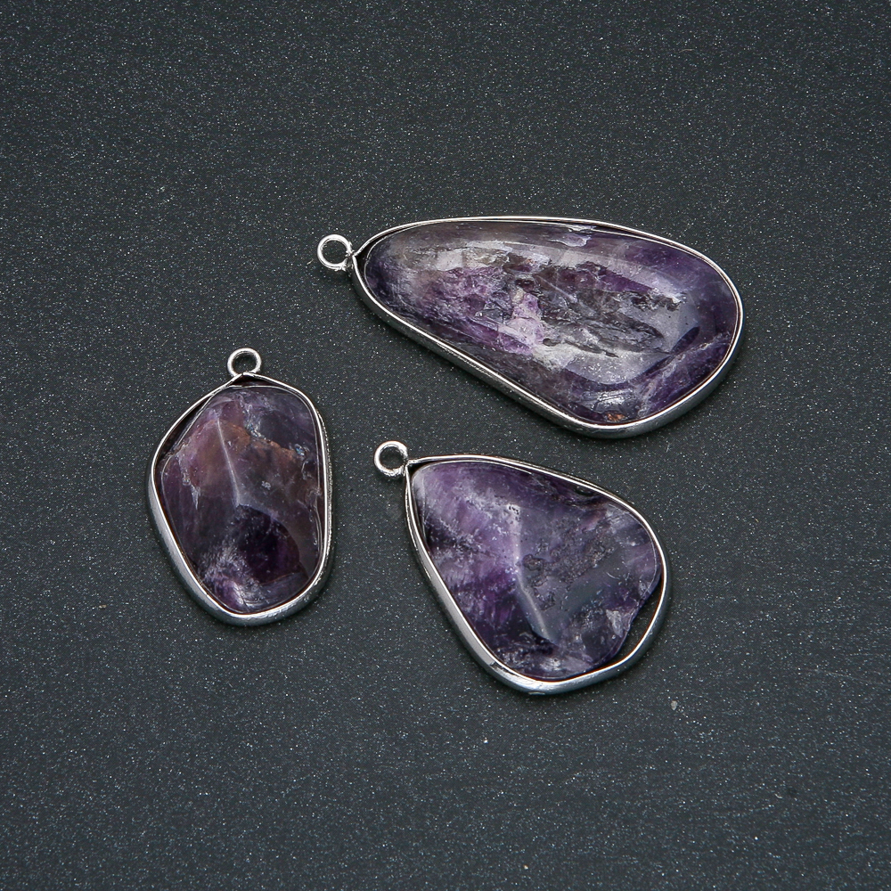 Amethyst pendant in a silver bezel, diameter 42x20 mm+