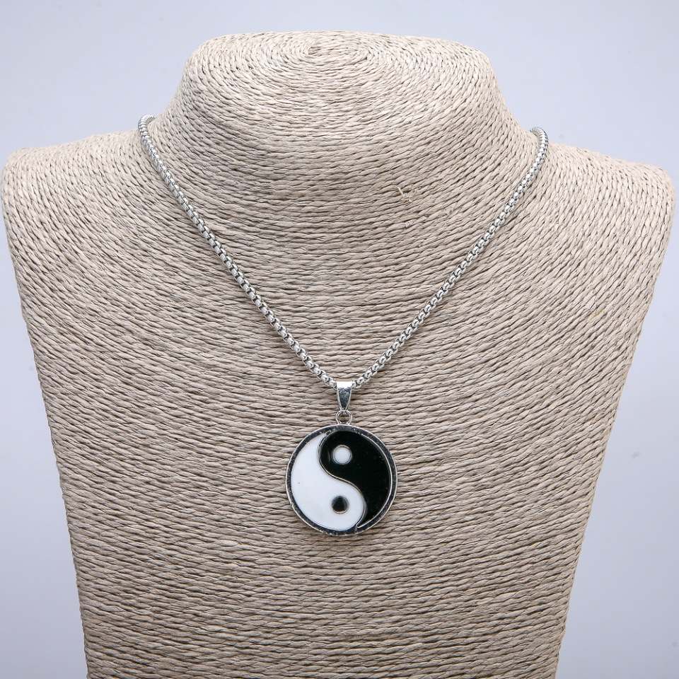 Pendant "Yin Yang" 43x30 mm on chain, length 70 cm, silver-colored metal