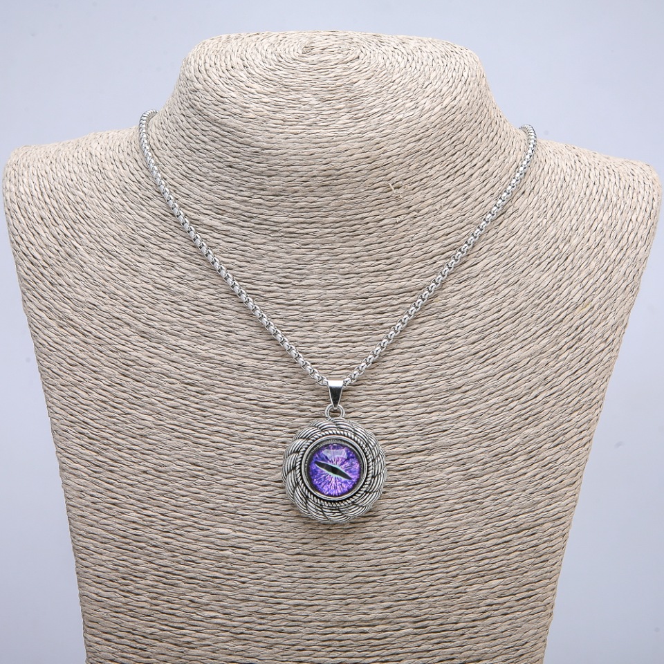 Pendant 'Dragon's Eye' in a bezel 42×30 mm on a chain, length 70 cm, silver-toned metal
