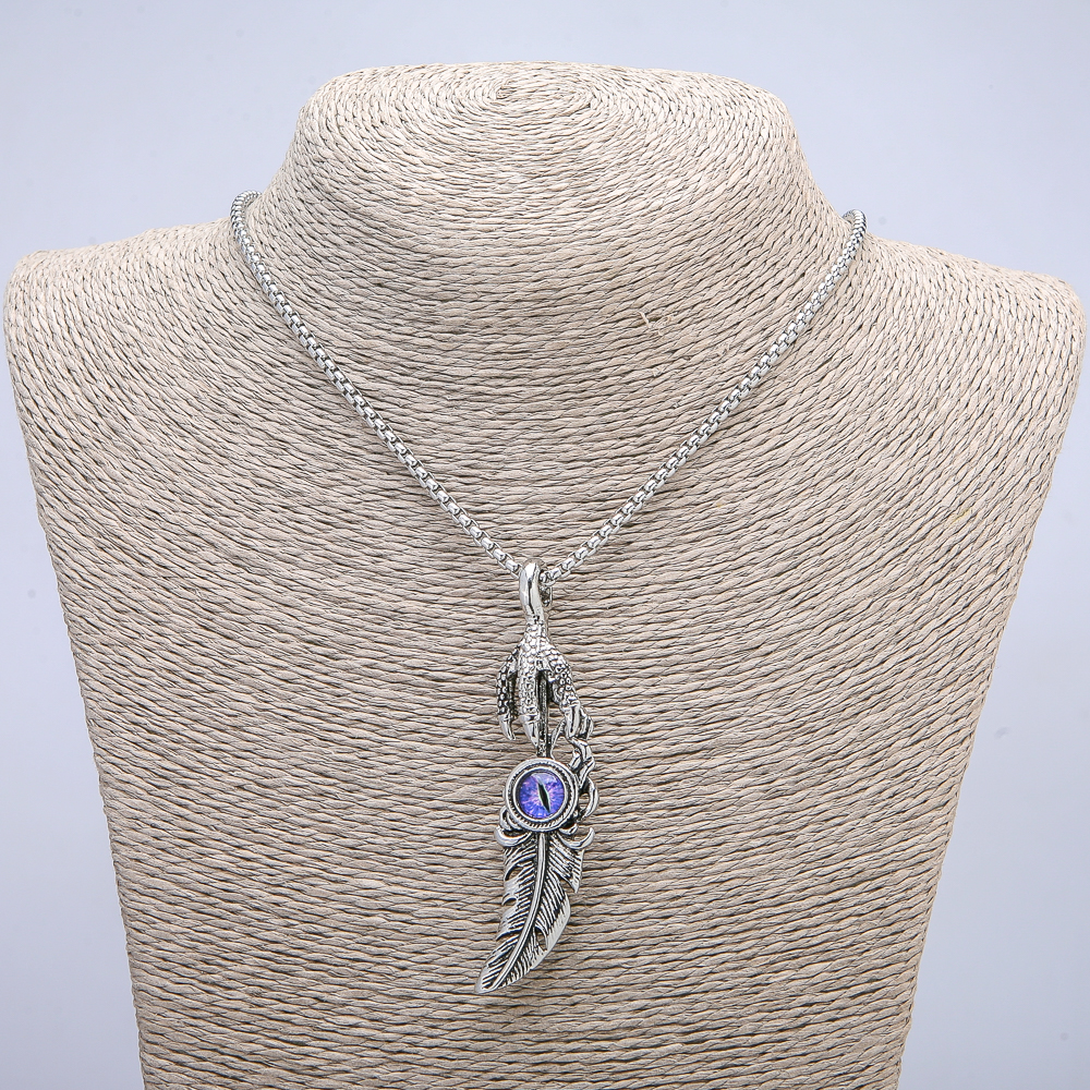 Pendant 'Paw with Dragon Eye Feather' 70×20 mm on a chain, length 70 cm silvery metal