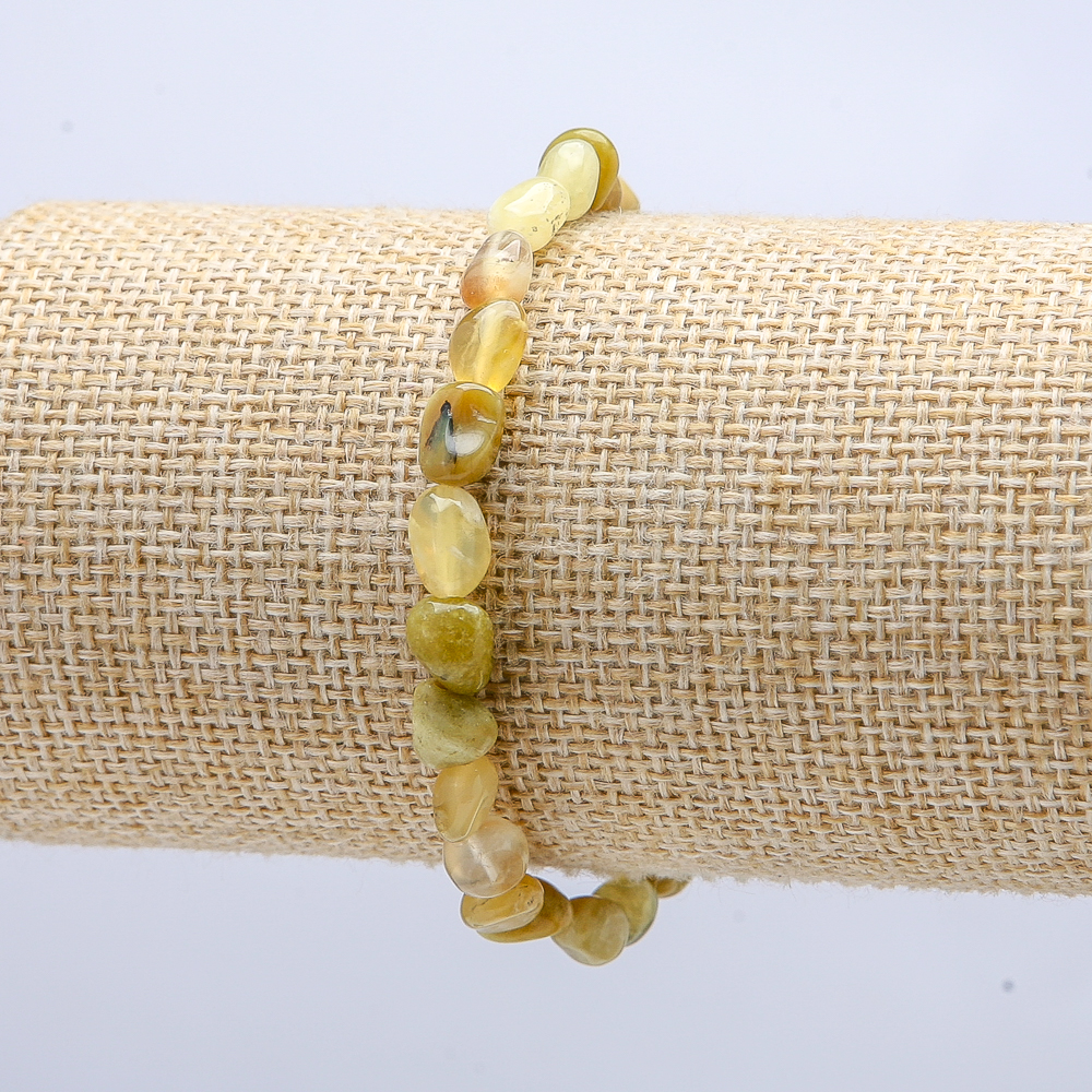 Elastic bracelet with natural yellow opal, faceted, 7x6 mm, 18 cm long
