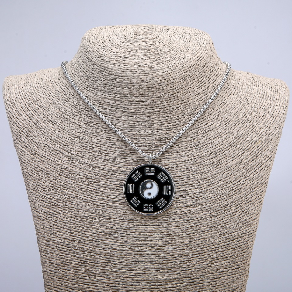 Pendant "Yin-Yang" 41×34 mm on a chain, length 70 cm, silver-toned metal
