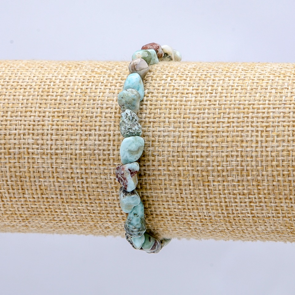 Elastic bracelet with natural Larimar stone — tumbled, 7x6 mm diameter.