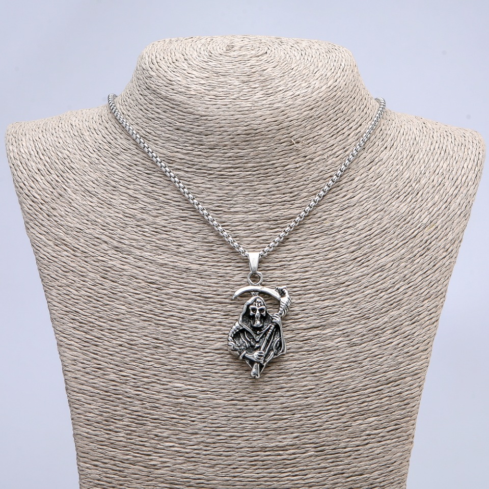 Pendant 'Death with a Scythe' 50×28 mm on a chain, length 70 cm +/- silver metal
