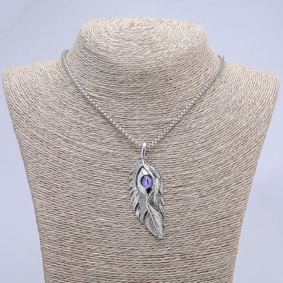 Pendant 'Feather with Dragon's Eye' 65×23 mm on a chain, length about 70 cm, silver-colored metal